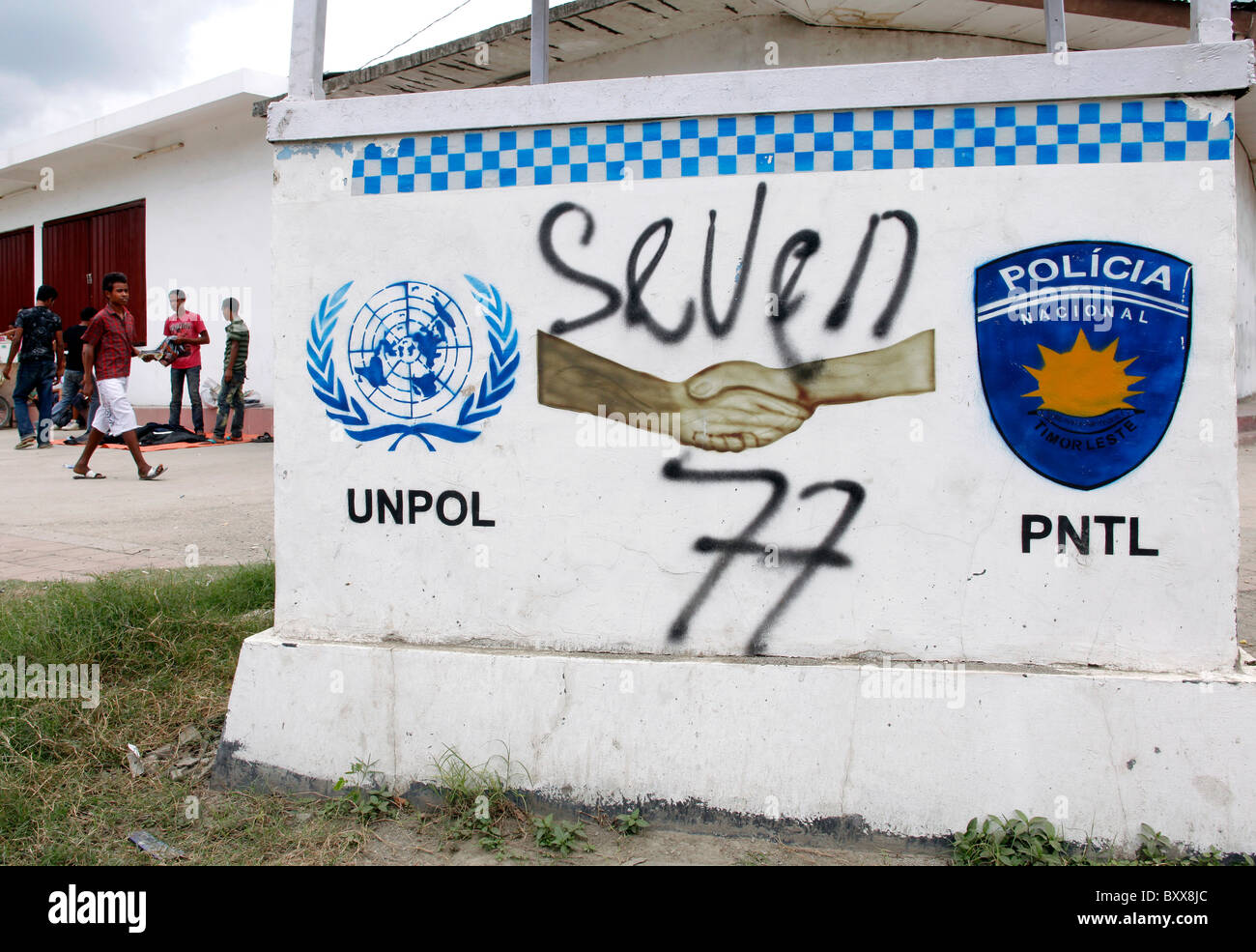 Sign of the notorious youth gang Seven-Seven on a police post in Dili, Timor Leste Stock Photo