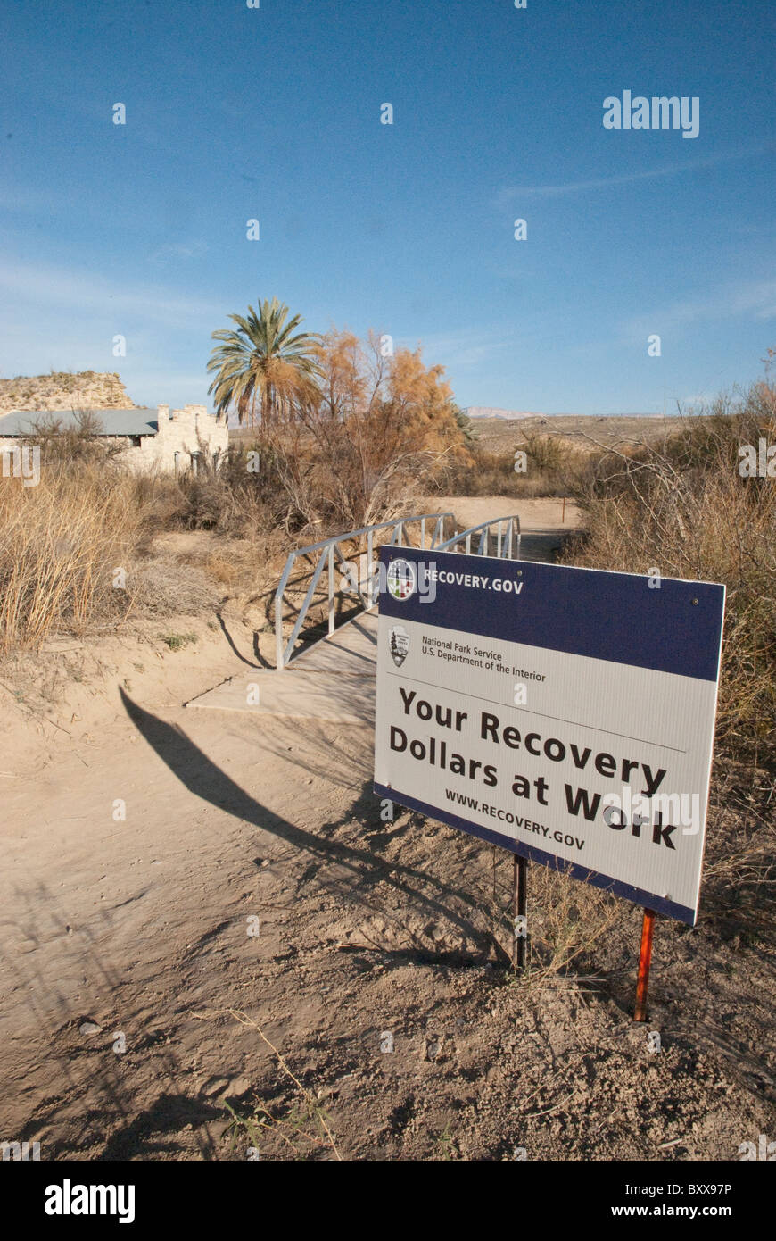 Sign describes scope of federal stimulus money used on bridge repair project at Big Bend National Park in far west Texas, USA Stock Photo
