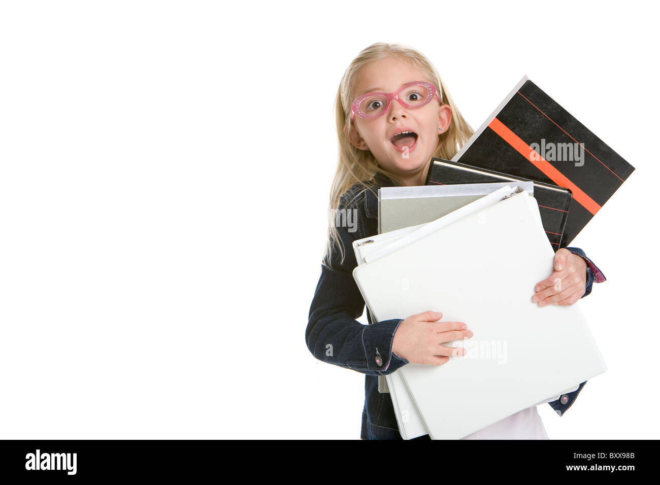 Cute little girl holding books isolated on white background Stock Photo ...