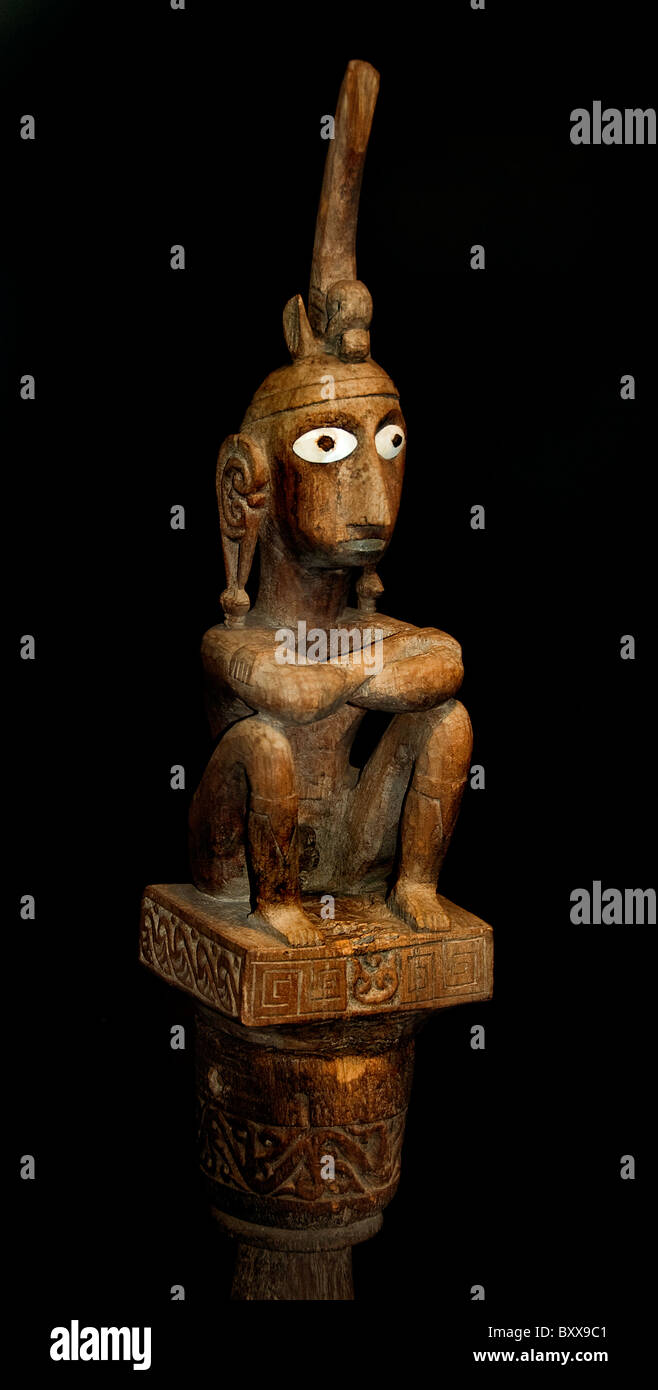 sculpture statue grandpa on a chair 1930 Southeast Maluku Moluccas Indonesia Indonesian Stock Photo