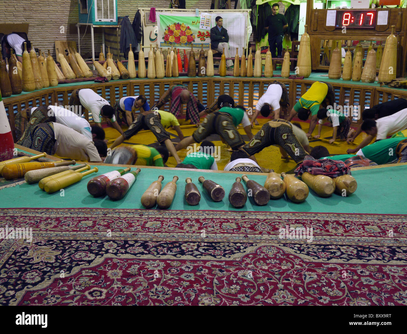 Men practicing Zurkhaneh in Yazd, Iran Stock Photo