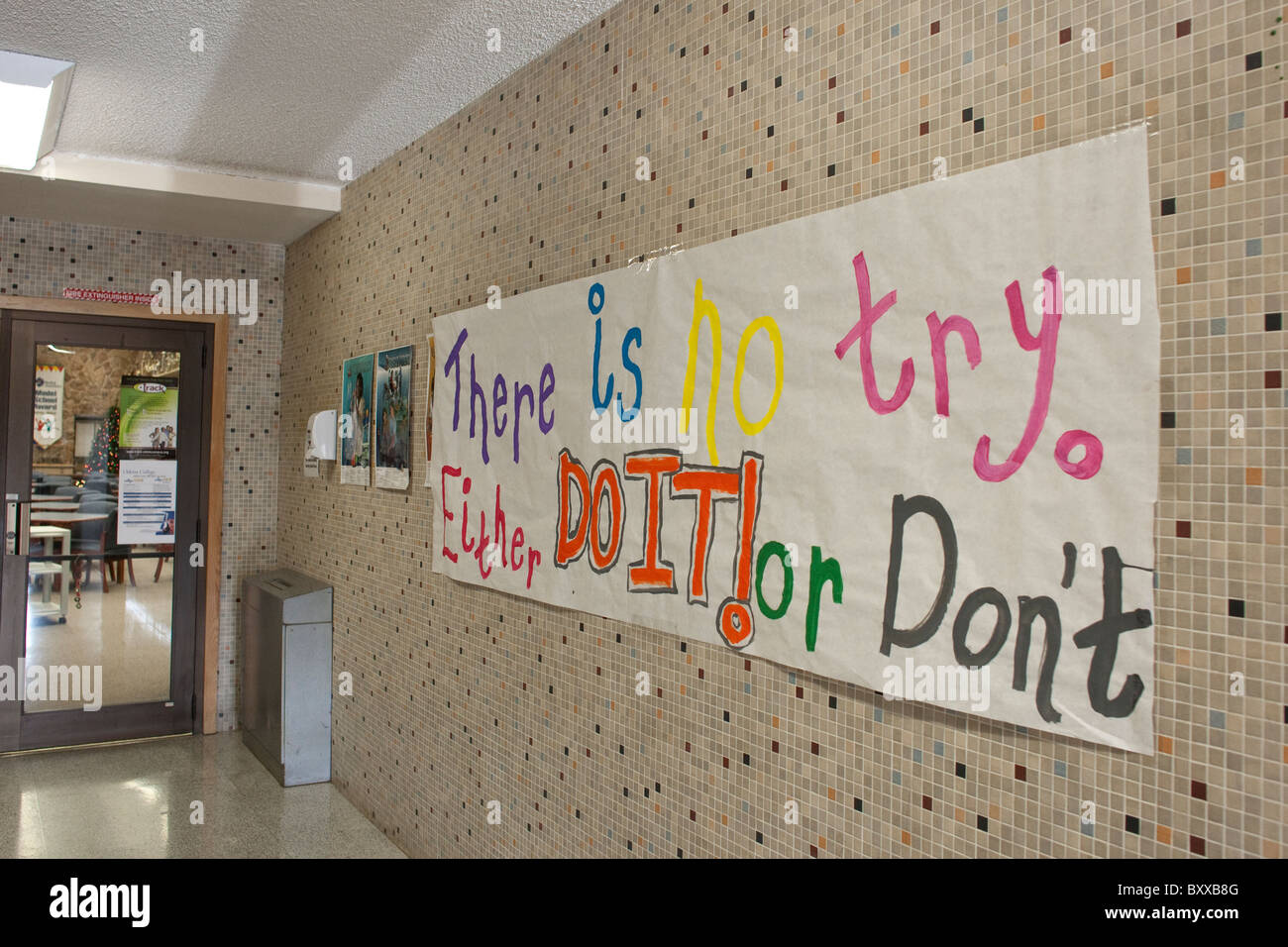 Hand-painted sign in hallway encourages students to try their best at McCamey High School in McCamey, Texas USA Stock Photo