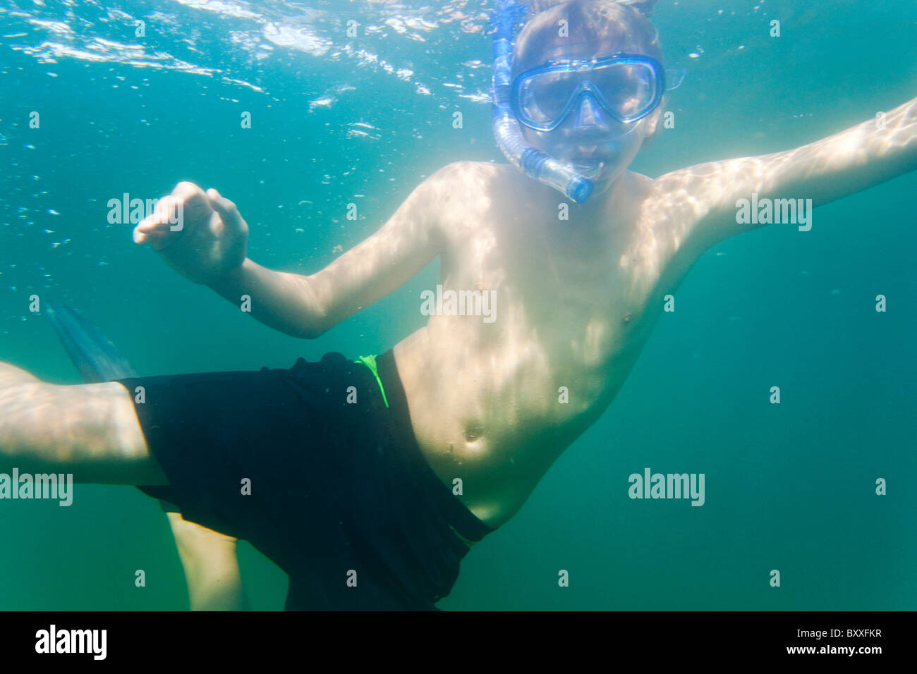 Teenager snorkeling in the water of Salto(Saltö) Sweden Stock Photo