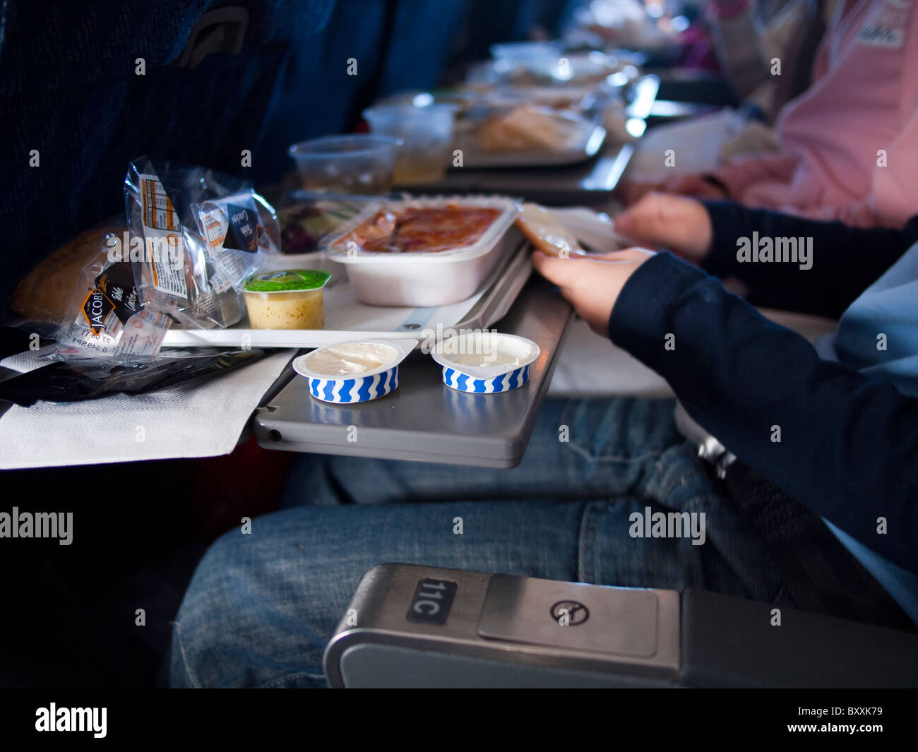 Aeroplane Meals Being Eaten on Board a Flight Stock Photo