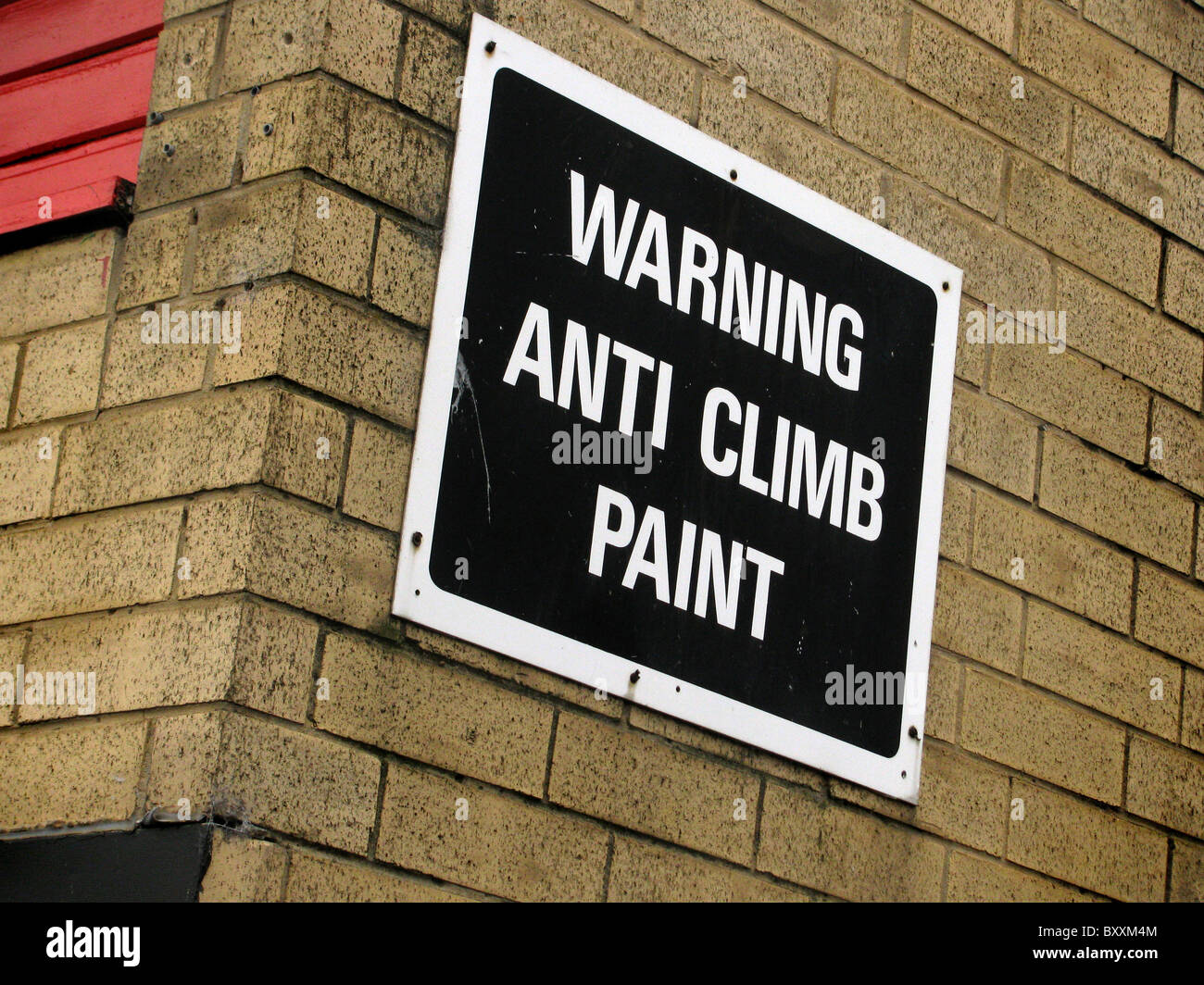Warning sign anticlimb paint Stock Photo Alamy