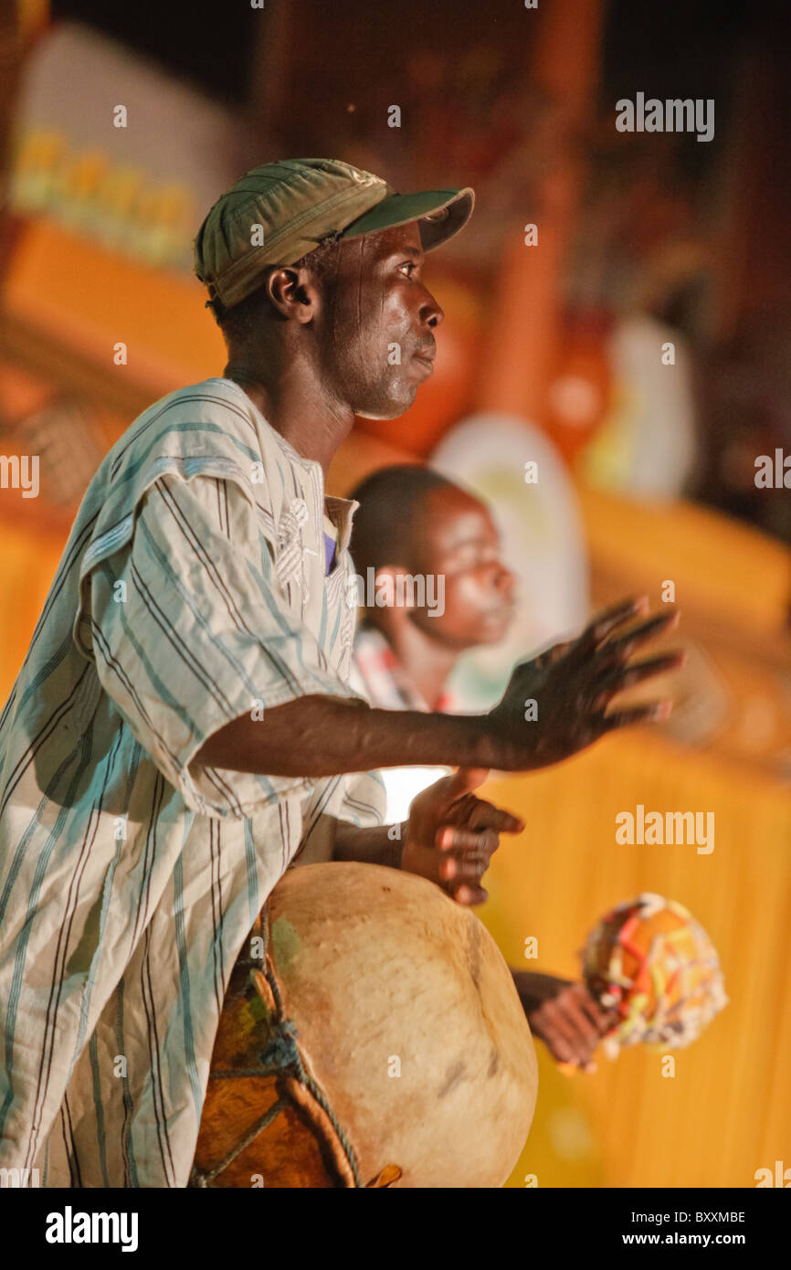 Musicians and dancers at the 12th biannual Salon International de l'Artisanat de Ouagadougou (SIAO) in Burkina Faso. Stock Photo