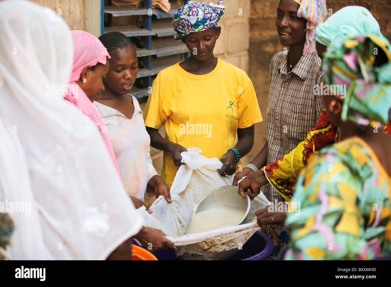 In Ouagadougou, Burkina Faso, Fulani women work together to make a