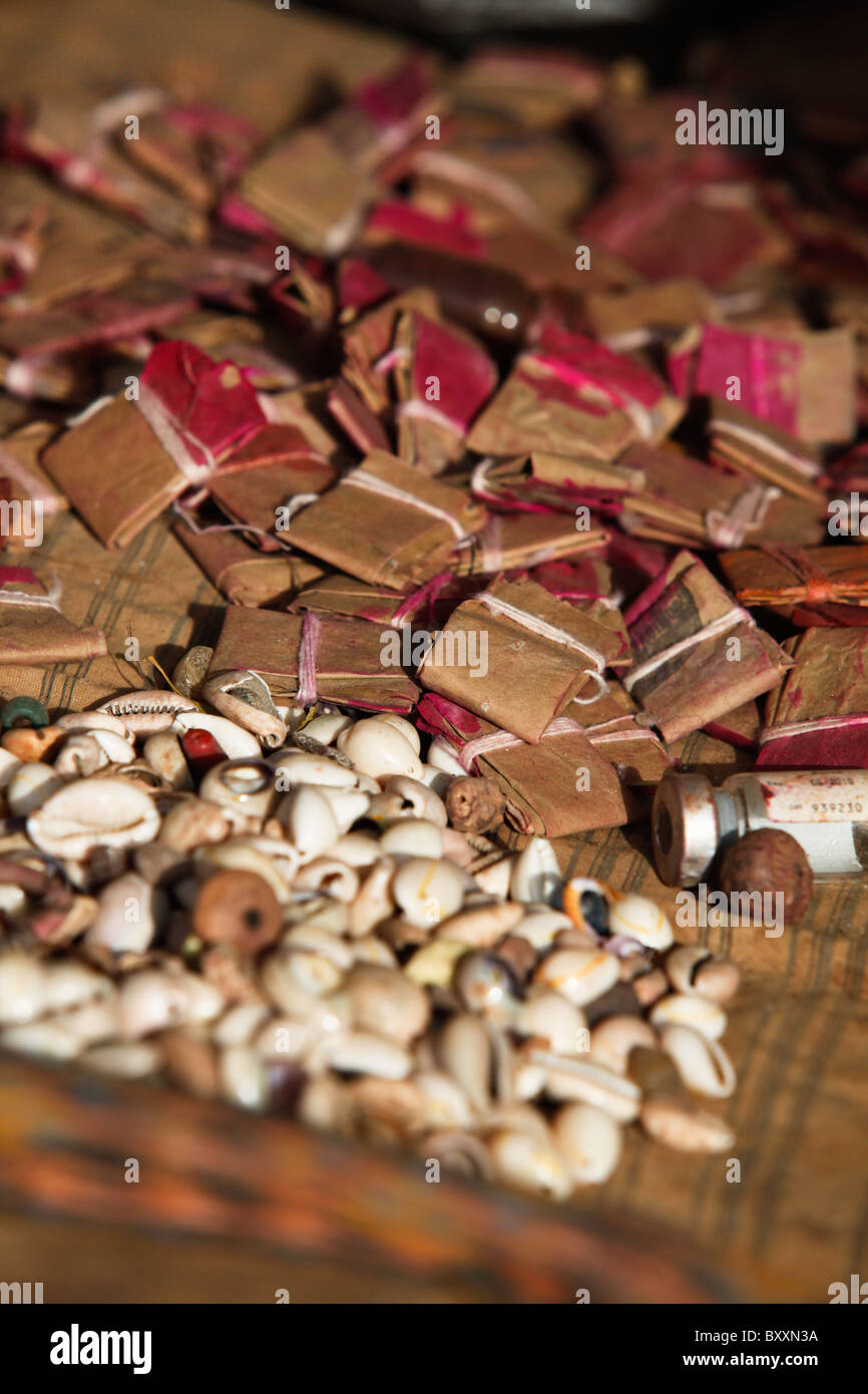 In the town of Djibo in northern Burkina Faso, red dyes and cowry shells are on sale in the market. Stock Photo