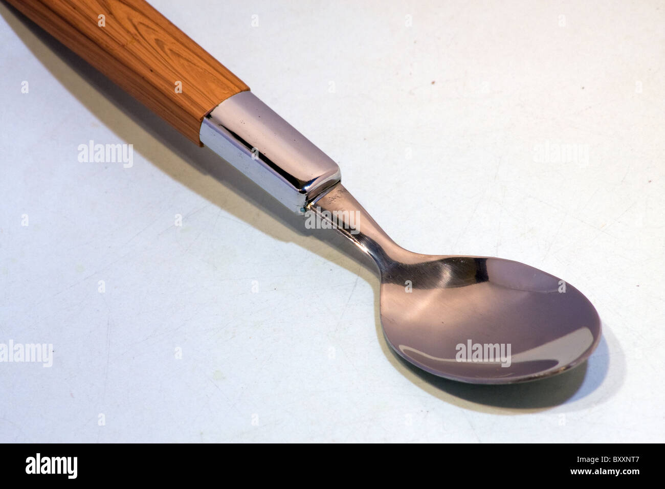 silver tea spoon cutlery measure wooden handle Stock Photo Alamy