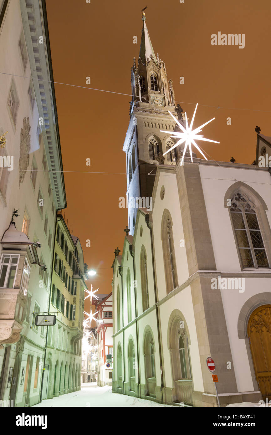 Church tower night time in St.Gallen in the winter Stock Photo