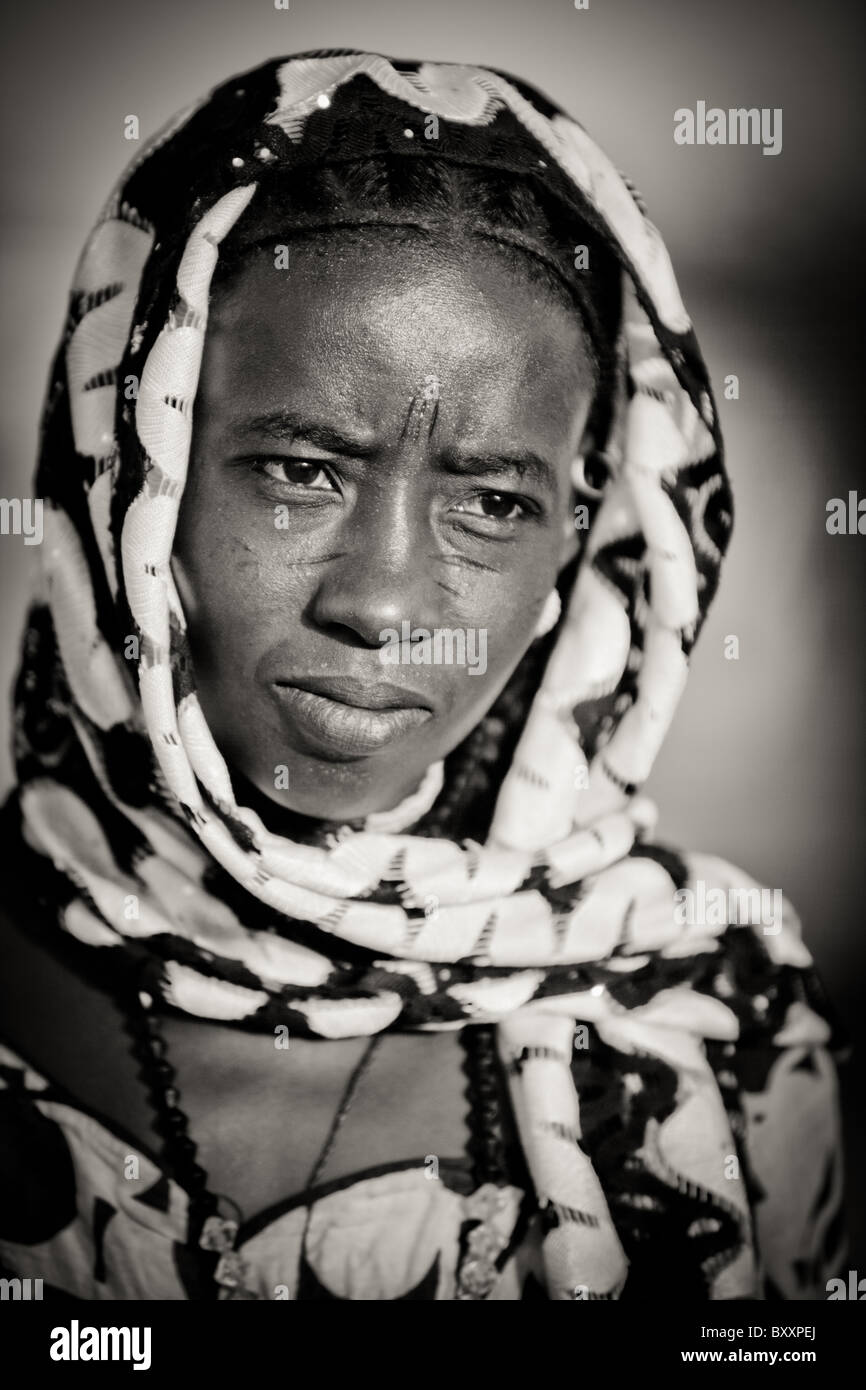 Tabaski (Eid-Al-Adha) is Muslim West Africa's largest holiday. Men, women, and children alike don their finest clothing. Stock Photo