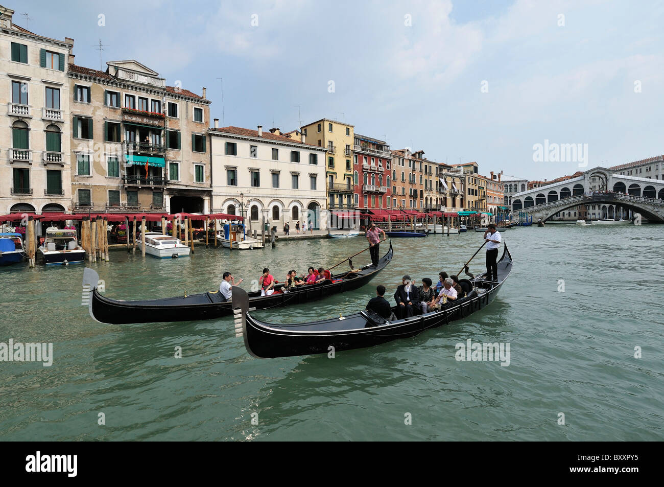 Venice. Italy. Tourists in gondolas on the Grand Canal. Stock Photo