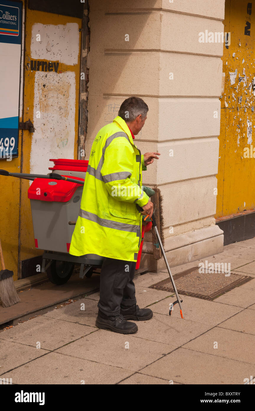 A Connaught road sweeper cleaning the streets in Norwich , Norfolk , England , Great Britain , Uk Stock Photo