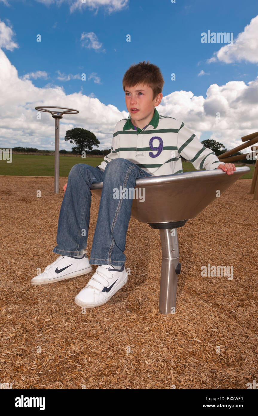 A MODEL RELEASED picture of an eleven year old boy in a play park in