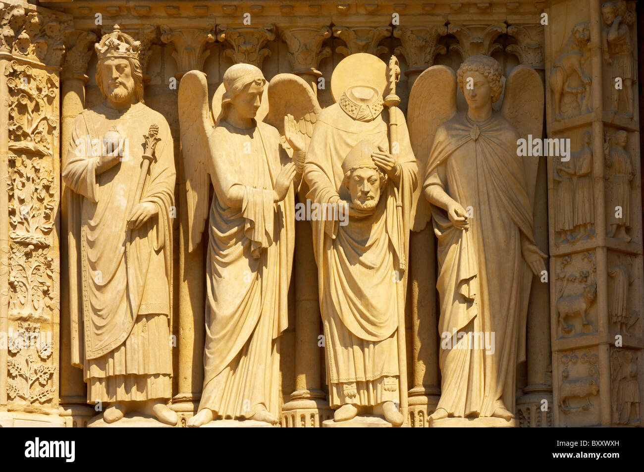 Close up of the Gothic statues on the facade of Notre Dame Cathedral