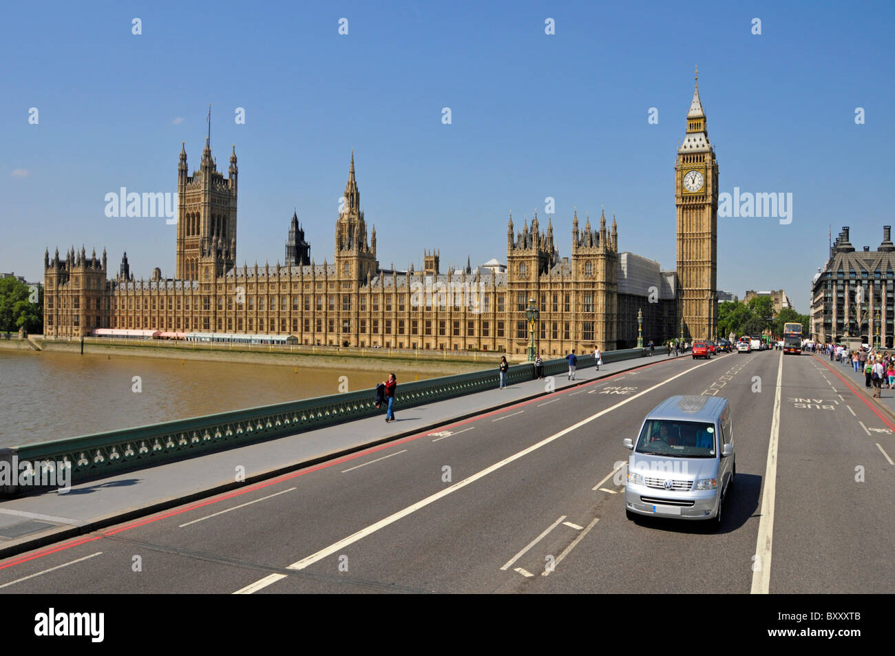 London street scene on Westminster Bridge Big Ben Houses of Parliament and Portcullis House on a blue sky summer day in London England UK Stock Photo