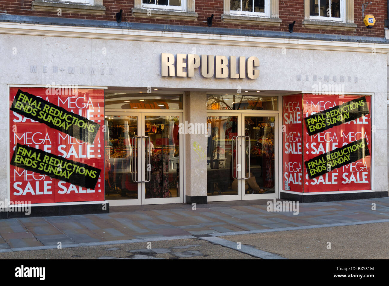 Sale signs in shop windows Stock Photo Alamy
