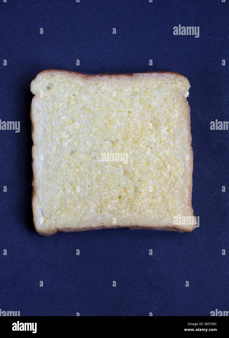 A Slice of Buttered Bread Stock Photo Alamy