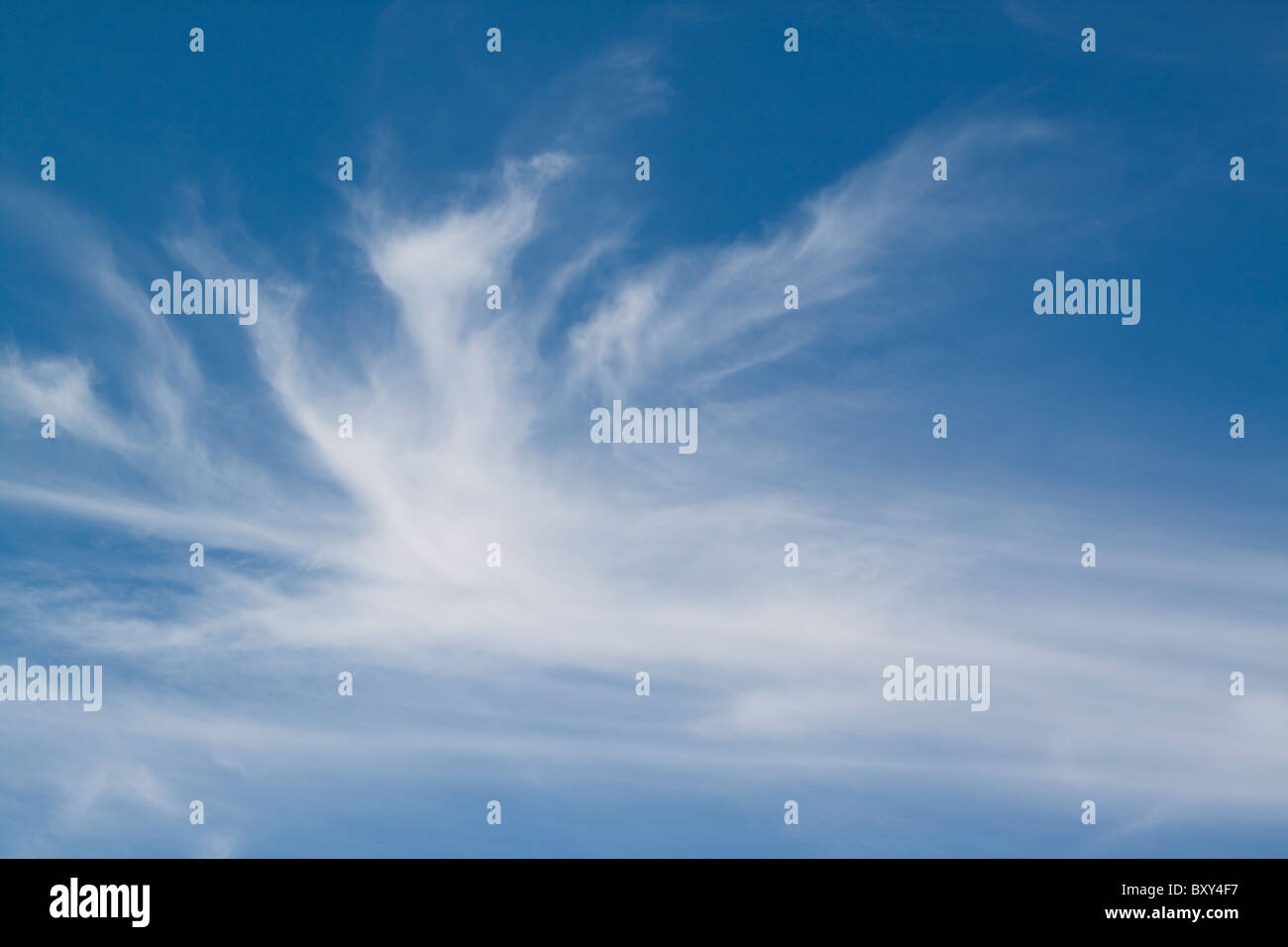 Wispy cirrus clouds against a blue sky Stock Photo - Alamy