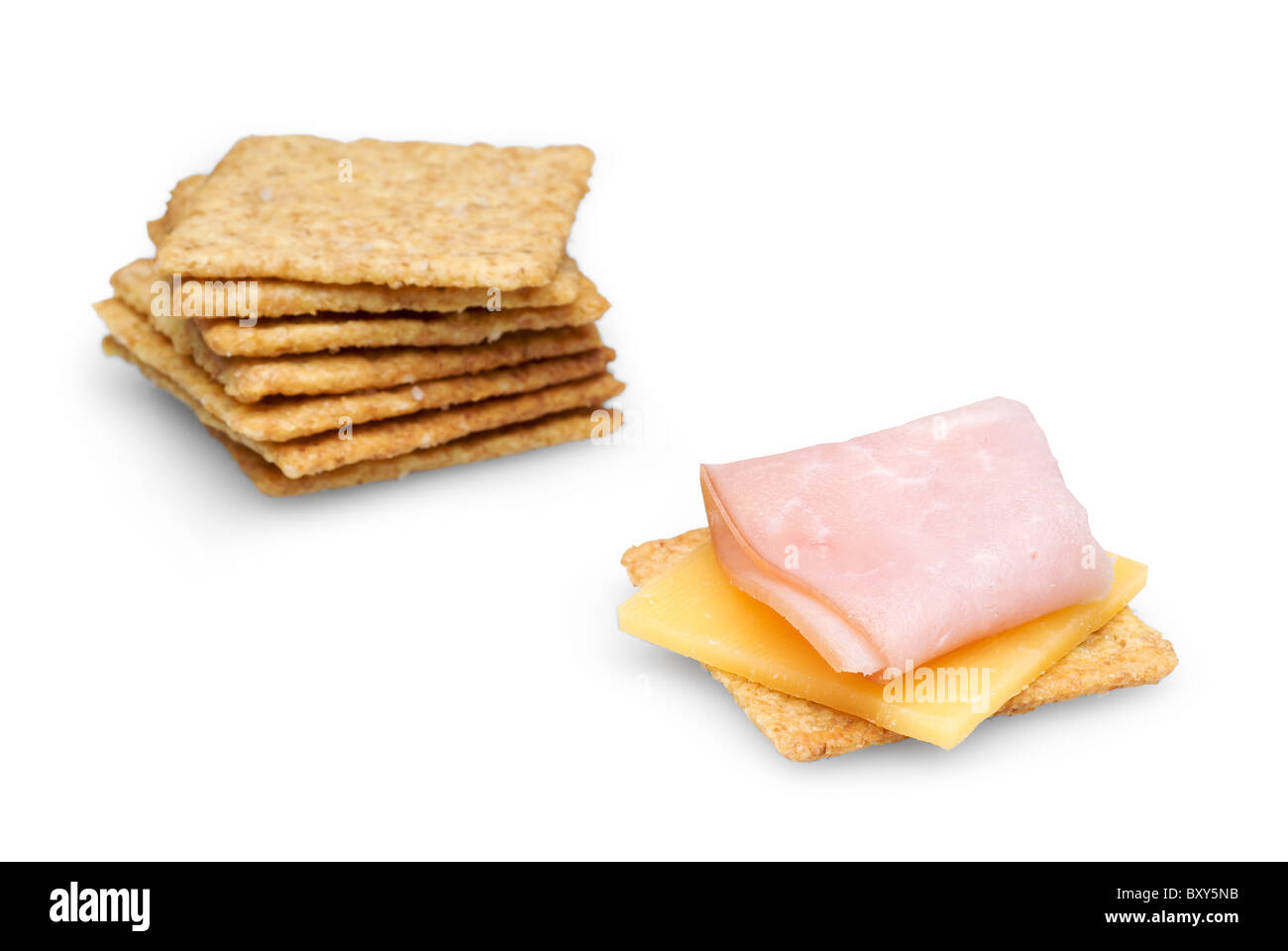 Crackers with Ham and Cheese isolated on white background with clipping