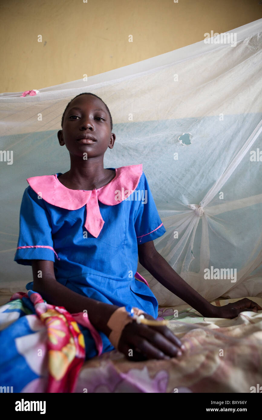 Christine Adongo (8) suffers from diarrhea and dehydration at Amuria Health Centre IV - Amuria District, Uganda, East Africa. Stock Photo