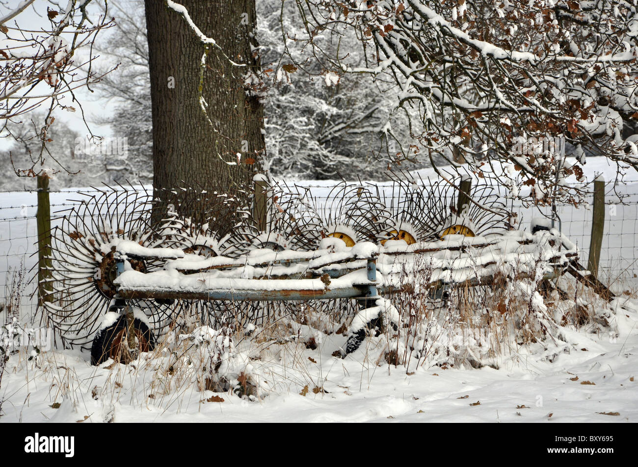 farming equipment covered in snow 2011 Stock Photo - Alamy