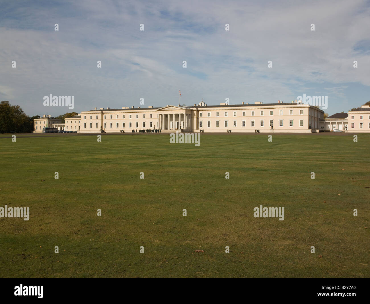 Sandhurst, Berkshire. Royal Military College, 1808-1812 by John Sanders. Long stucco facade with Greek Doric pedimented portico Stock Photo