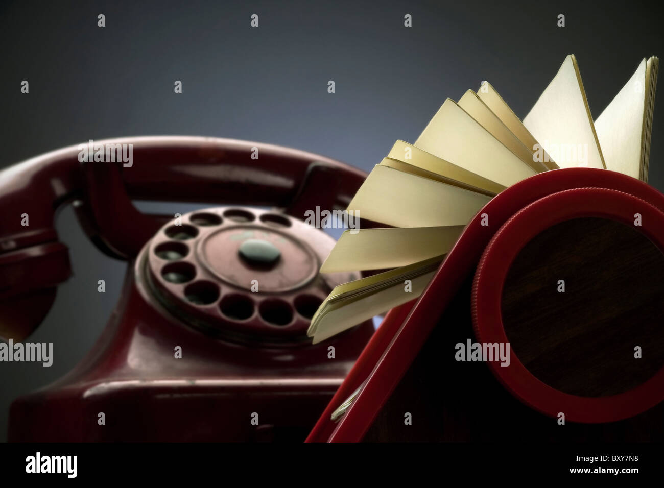 rotary card index with removable cards and an old red telephone Stock