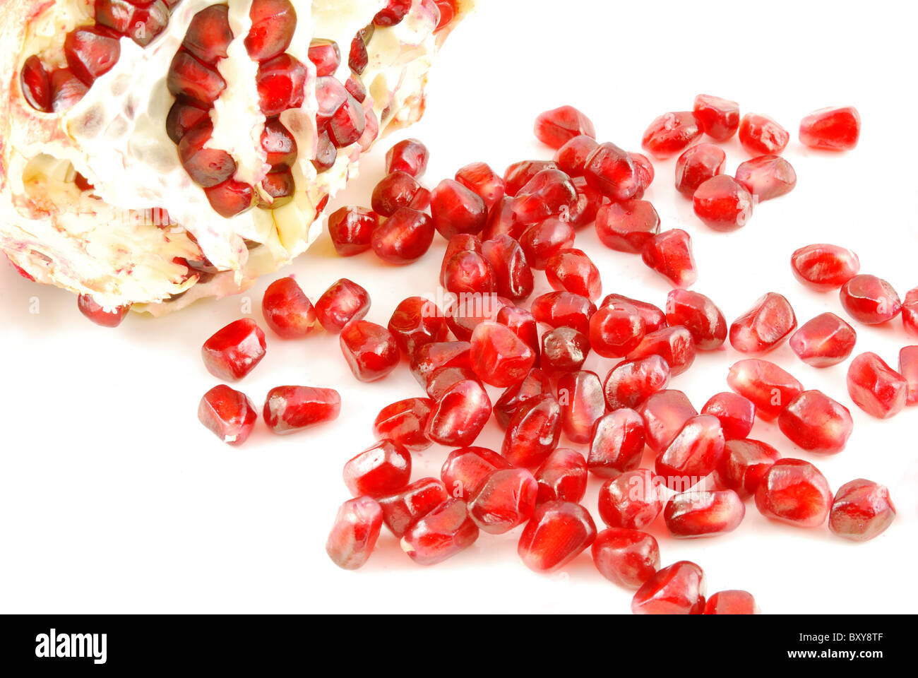 Granate seed closeup with white background Stock Photo