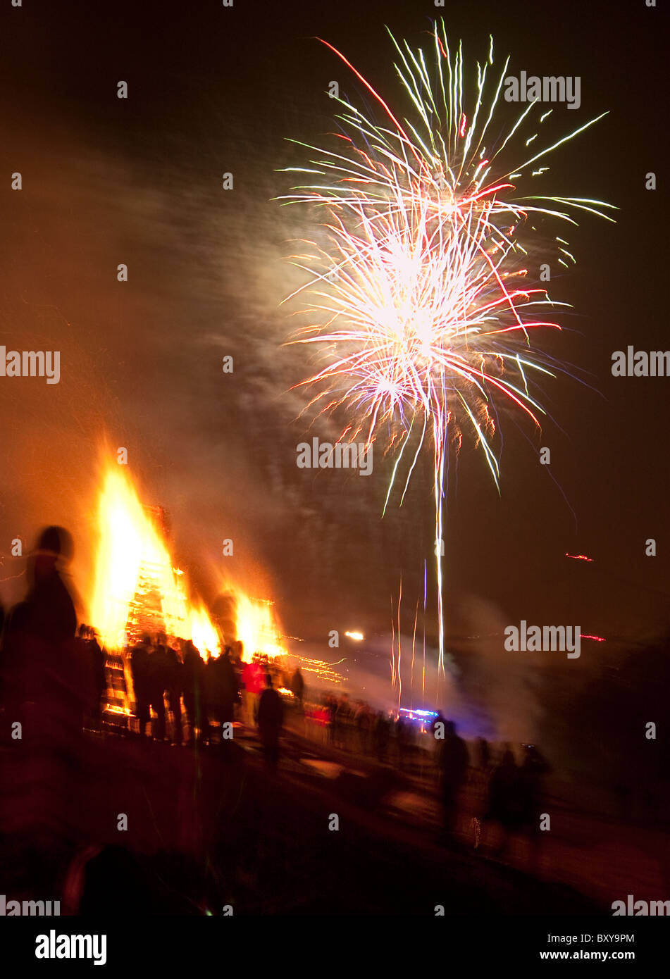 Traditional Christmas eve bonfires and fireworks on the levee in