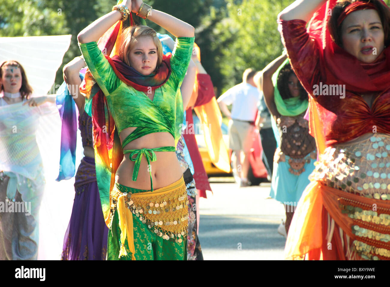 Belly dancing group performing in a parade in a rural community east of Seattle called North Bend. Stock Photo