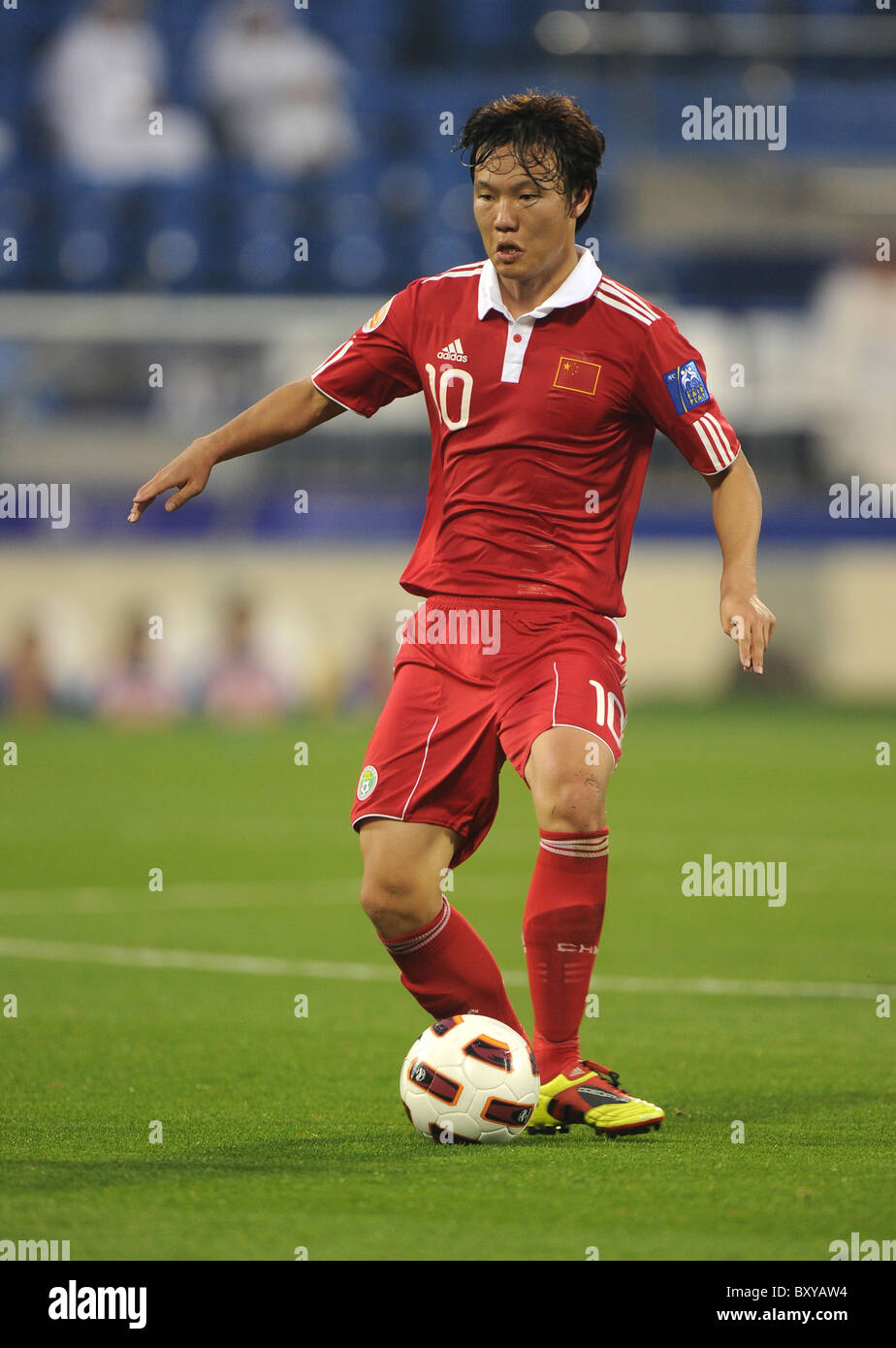 Deng Zhuoxiang of China Soccer - Asian Cup 2011 - Group A - Kuwait v China Stock Photo