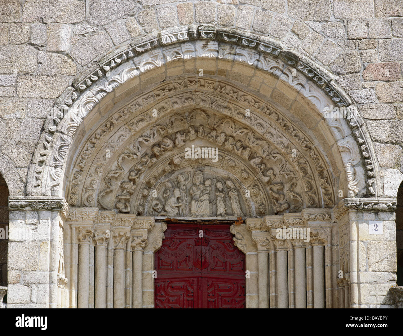 Church of St. Mary of Azogue. Archivolts and tympanum depicting the Adoration of the Magi and the  Annunciation. Betanzos. Spain Stock Photo