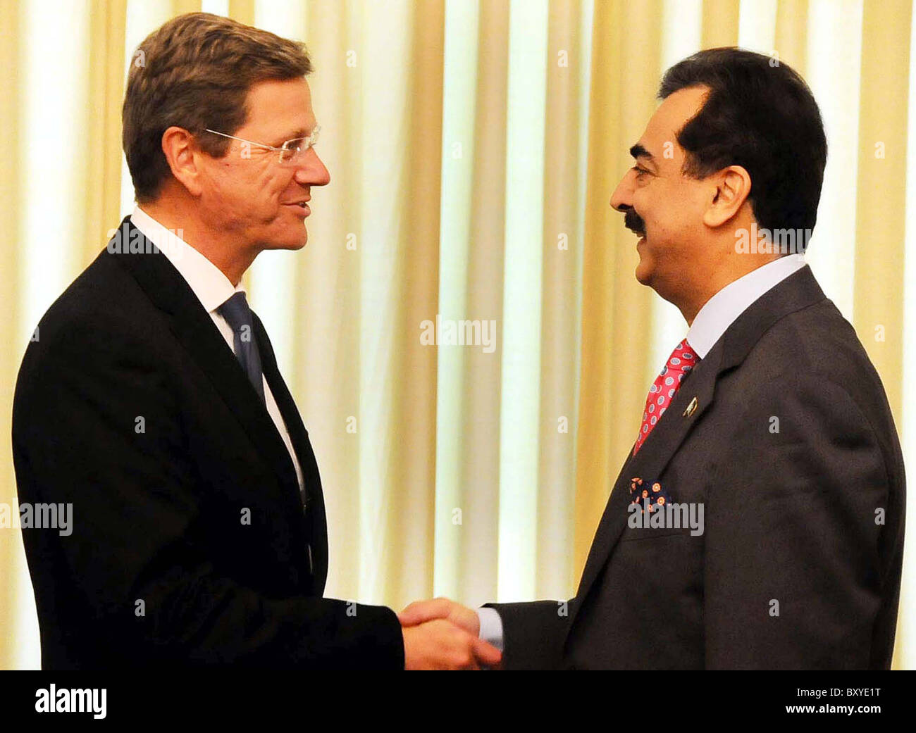 Prime Minister, Syed Yousuf Raza Gilani shakes hand with Dr.Guido Westerwelle, Foreign Minister of the Federal Republic Stock Photo