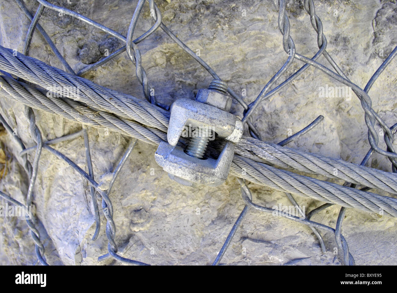 wire mesh to contain rocks and stones fall Stock Photo