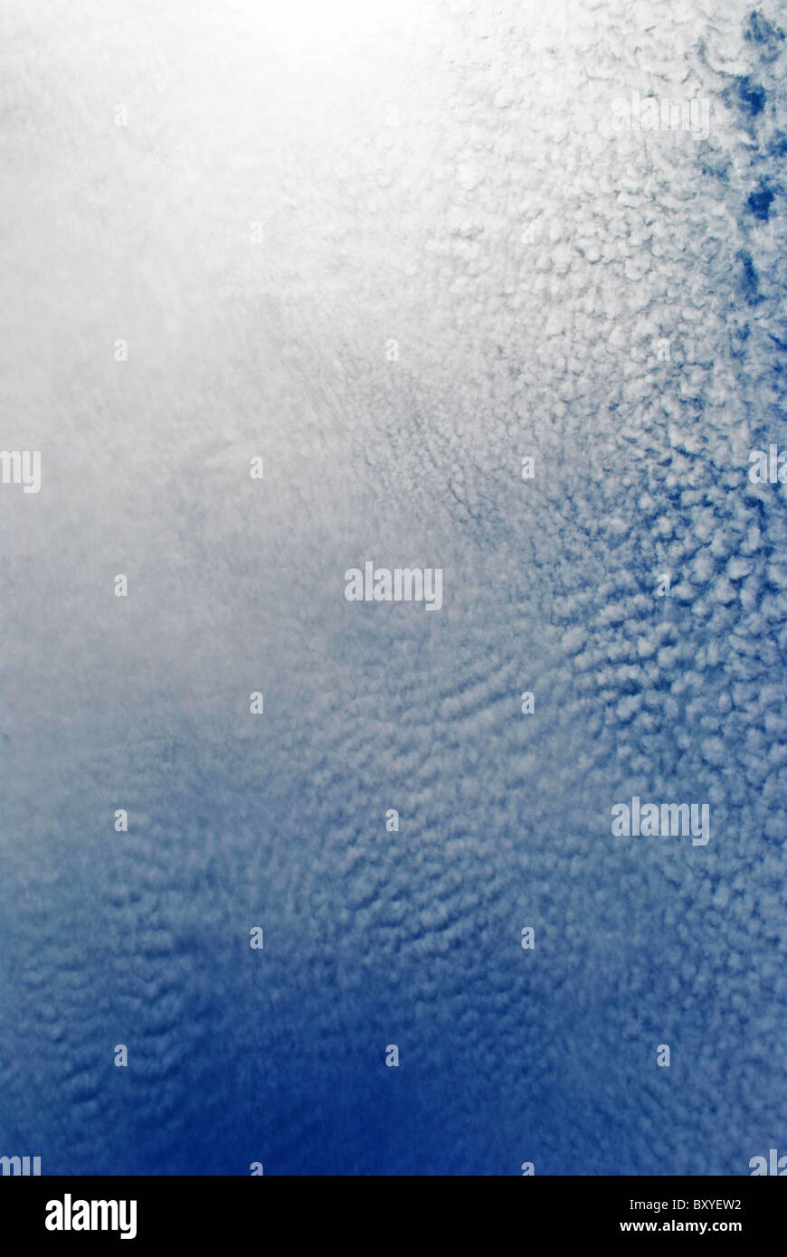 blue sky with white fluffy clouds background texture Stock Photo - Alamy