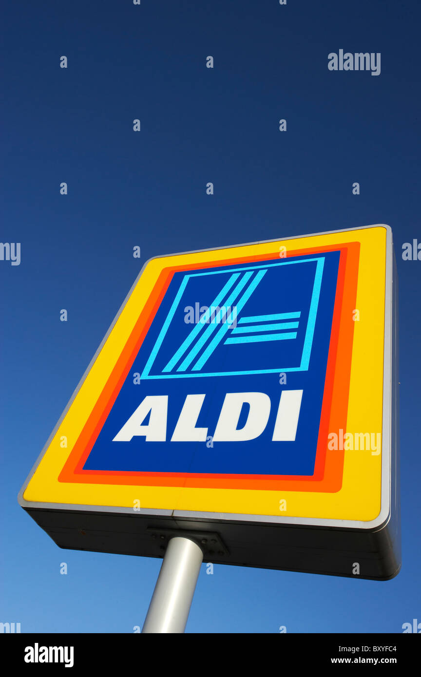 Aldi sign isolated against blue sky Stock Photo Alamy