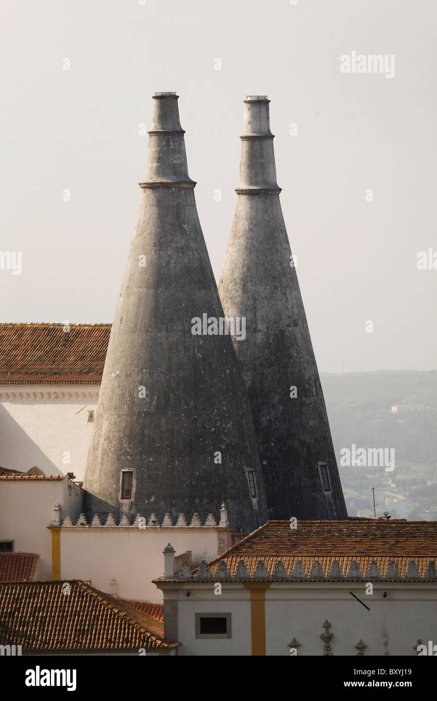 The landmark twin towers of the palace chimneys of Sintra, Portugal. Stock Photo