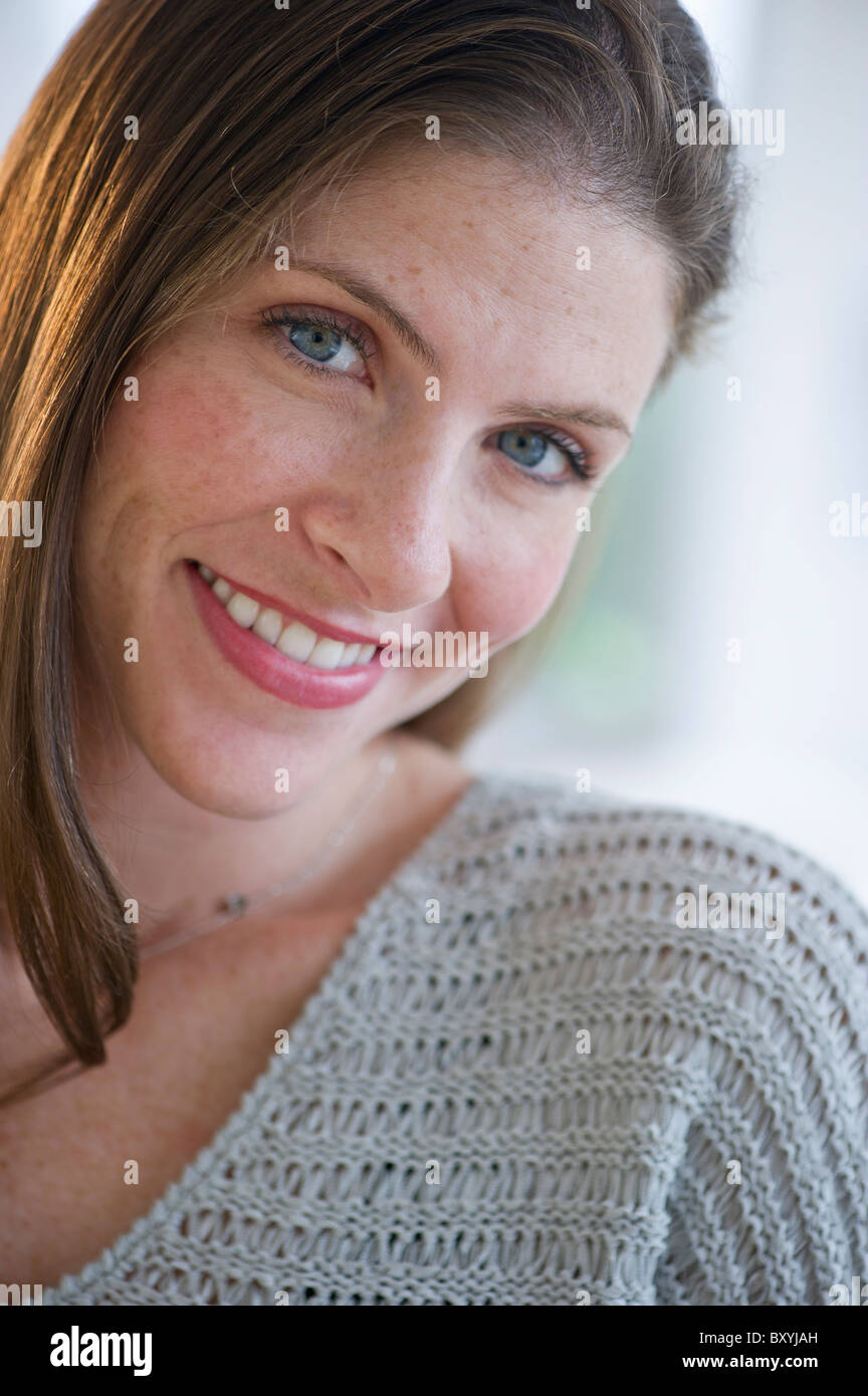 Portrait of smiling woman Stock Photo