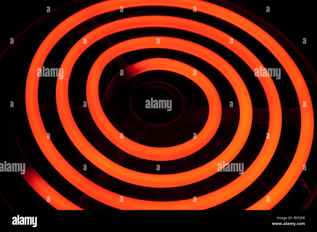 Electric cooker element glowing red hot Stock Photo Alamy