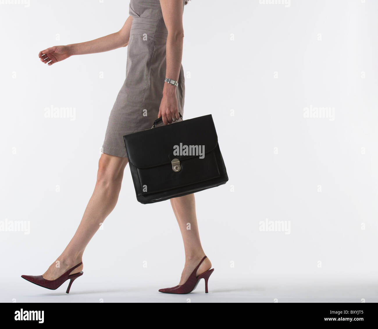 Low section of woman holding briefcase Stock Photo