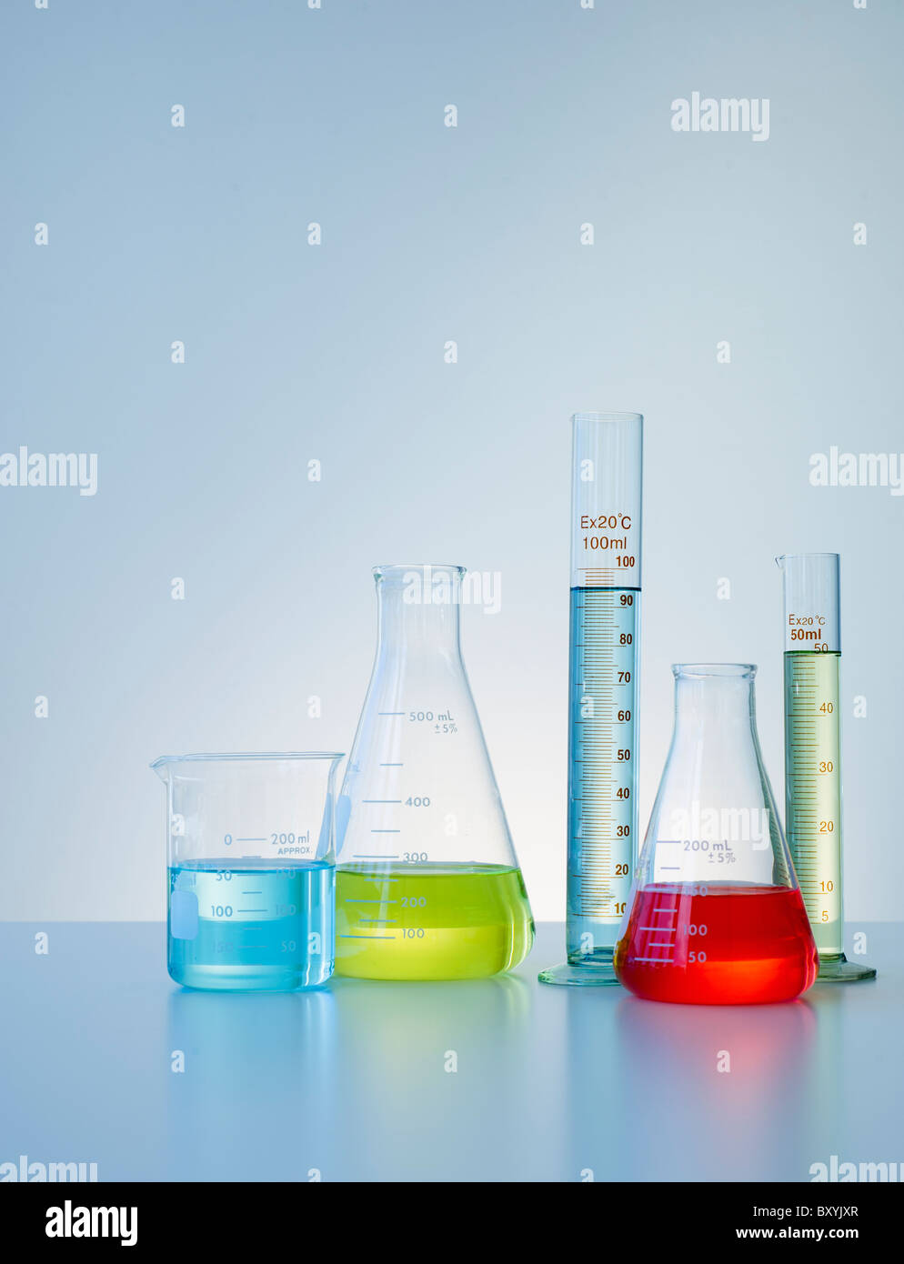 Beakers and flasks with colorful liquids Stock Photo Alamy
