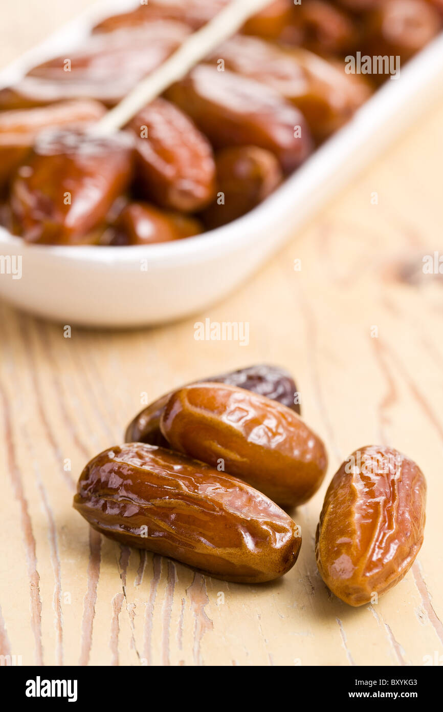dried dates on kitchen table Stock Photo
