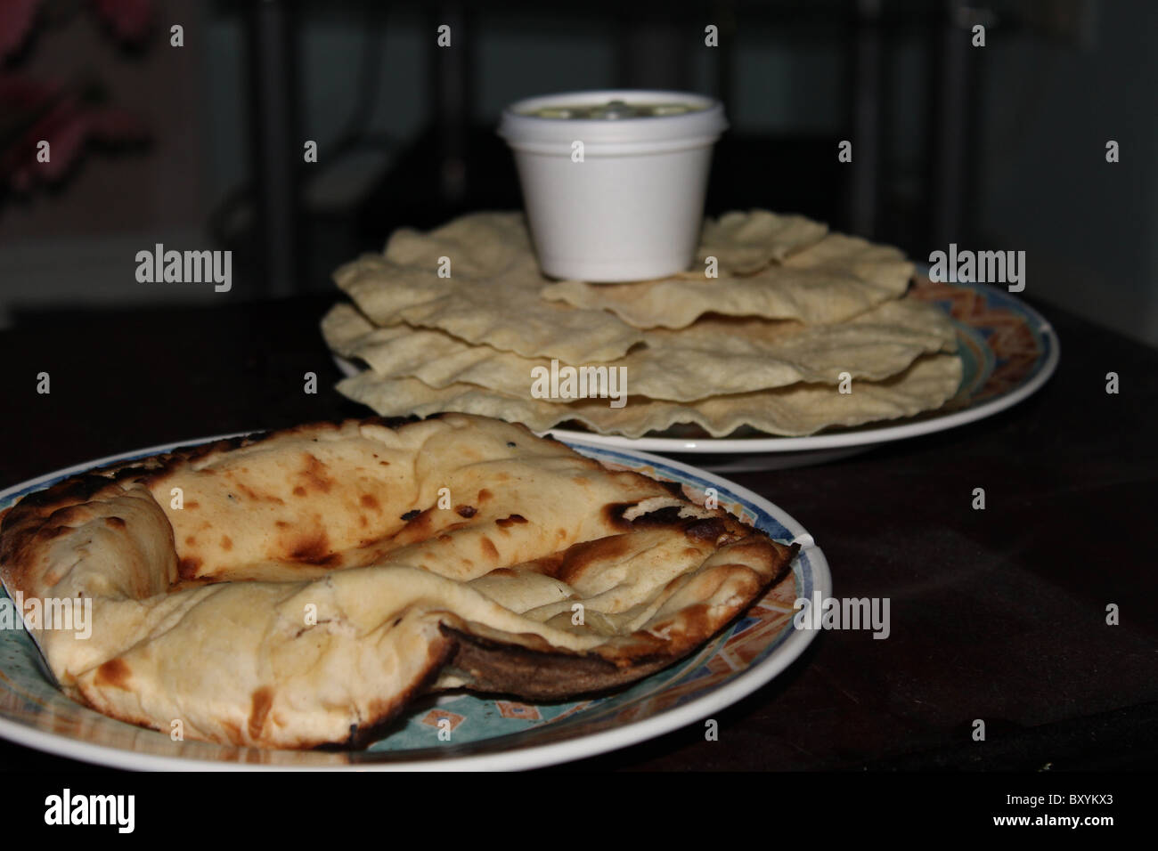Poppadoms and Naan Bread Stock Photo - Alamy