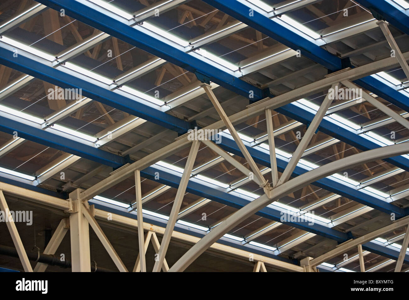 Solar panels on glass roof of modern building Stock Photo Alamy