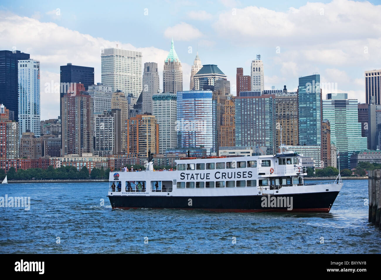 Cruise ship on Hudson River, Battery Park in background Stock Photo Alamy