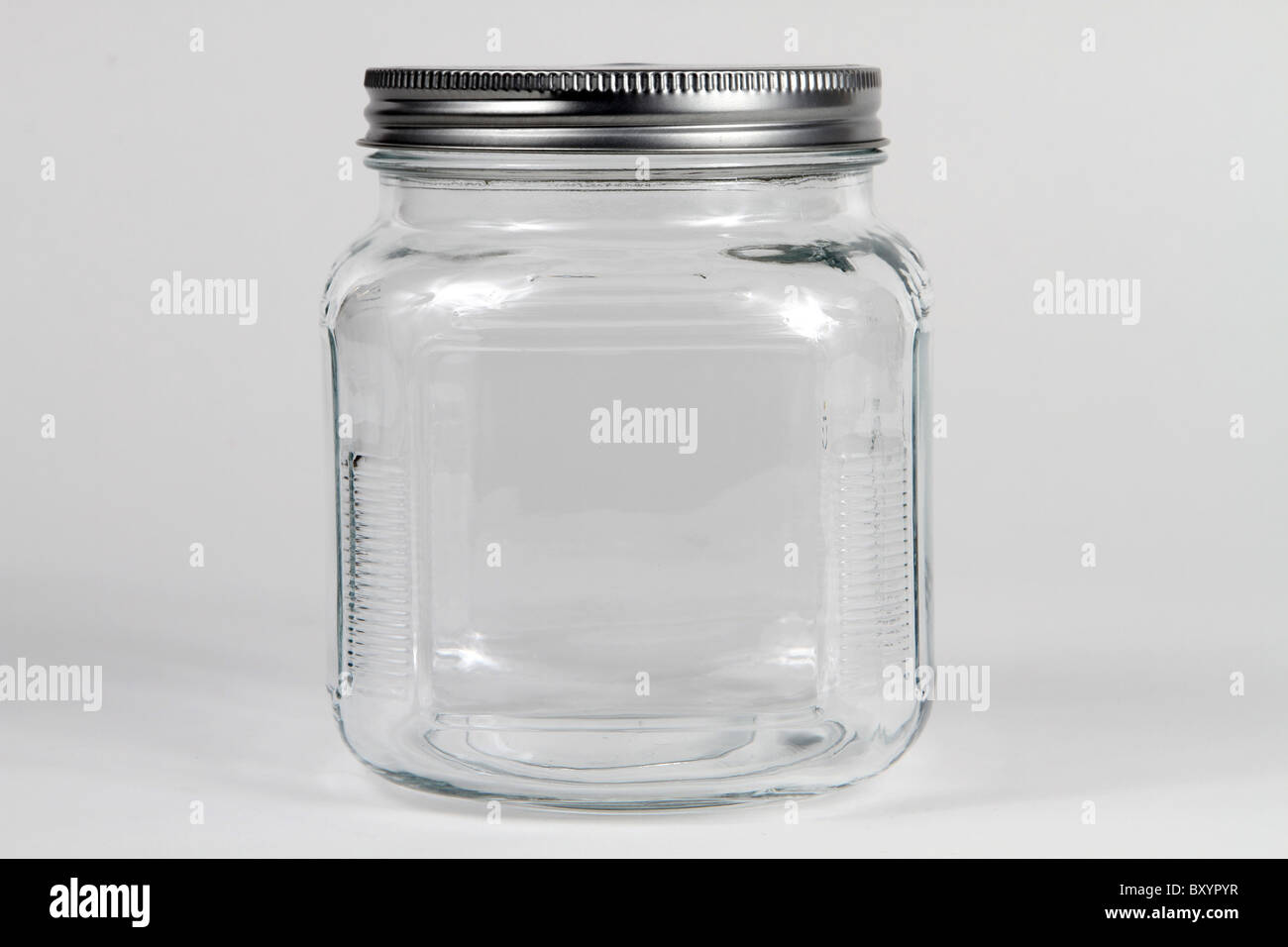 Empty clear glass jar with screw lid Stock Photo Alamy
