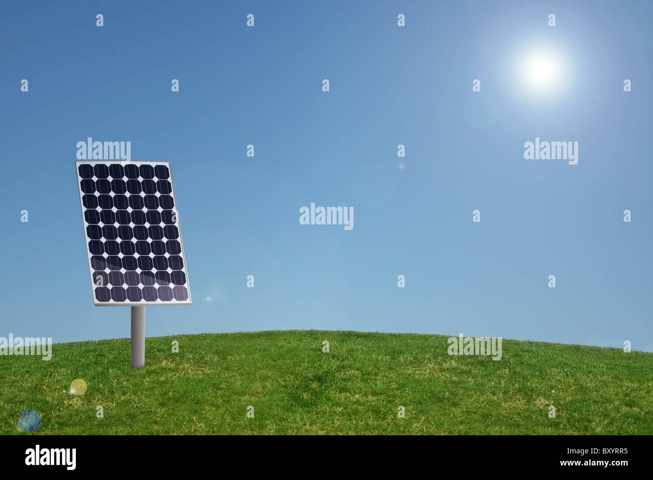 Solar panel in grass with blue sky Stock Photo