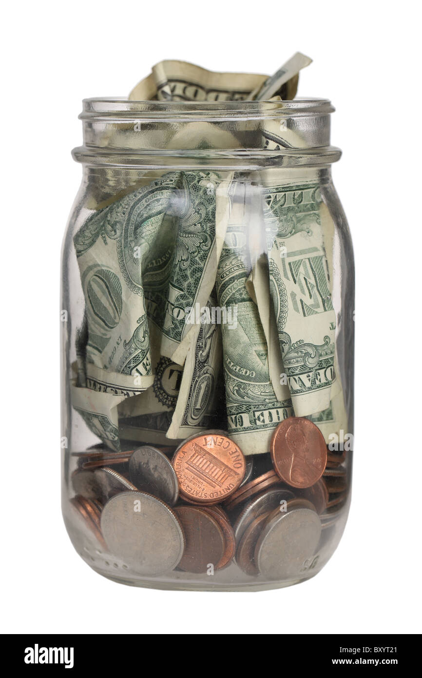 Jar full of money on white background Stock Photo