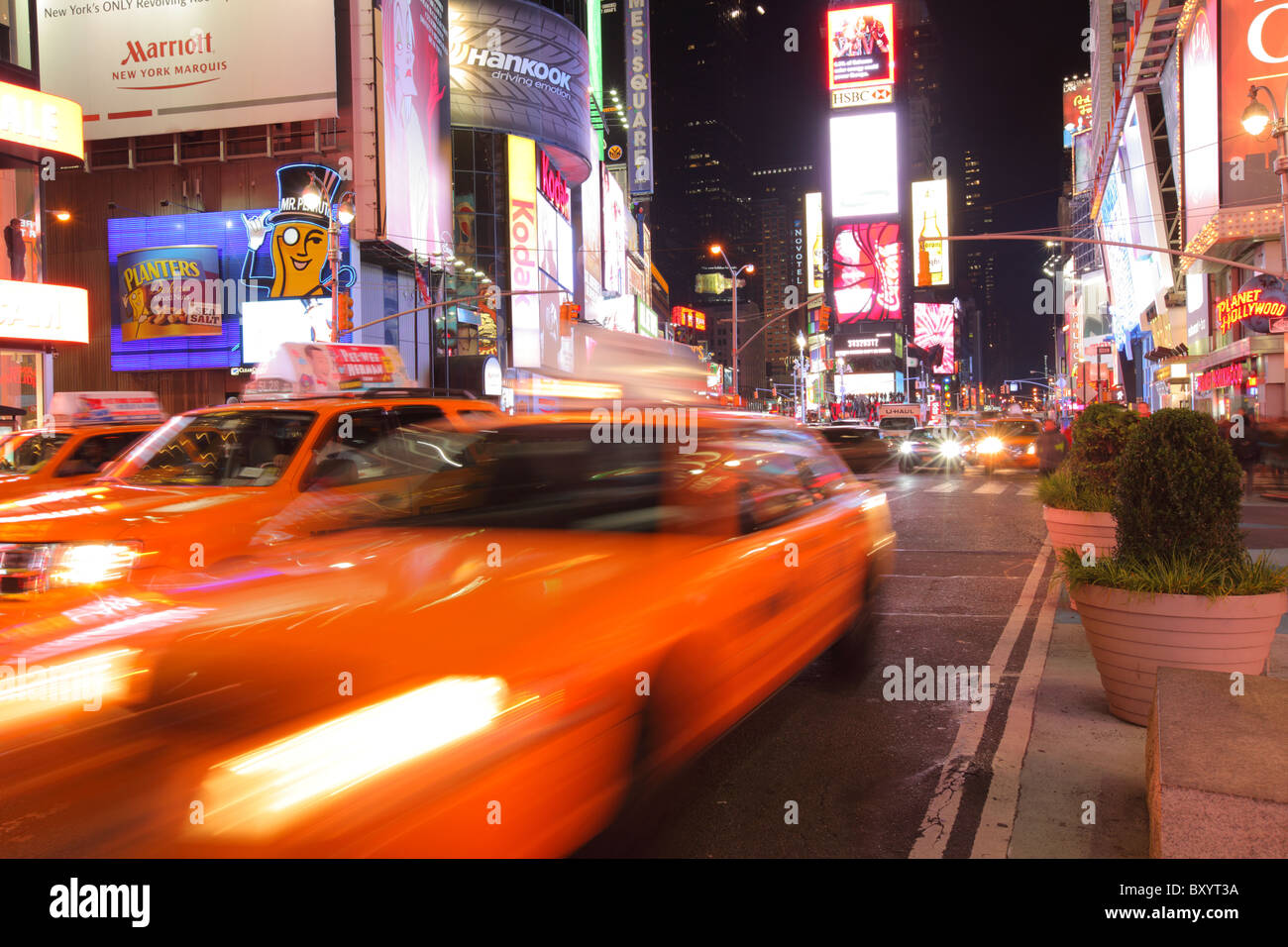 Taxi's driving, Times Square, Manhattan, New York City Stock Photo